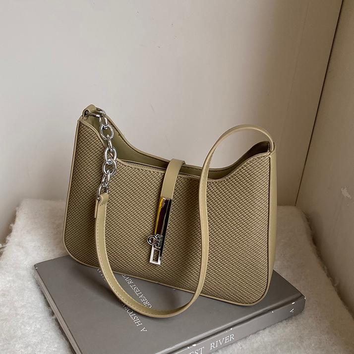 Nicho de diseño simple y versátil bolso de braza para mujeres 2025, nuevo estilo de alta calidad bolso de hombro de moda bolso de trabajo de viaje de mujer
