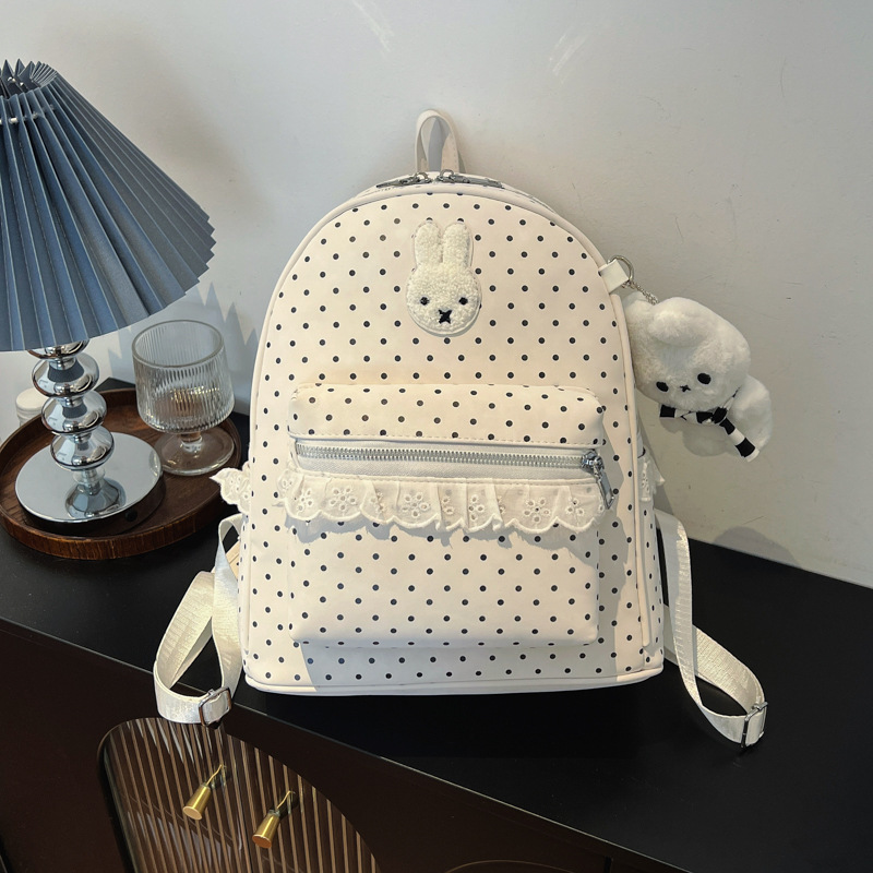 Nuevo estilo coreano dulce simple mochila pequeña mochila de conejo punto ondulado lindo mochila de alto valor de la cara fuera de la mochila de estudiantes de viaje