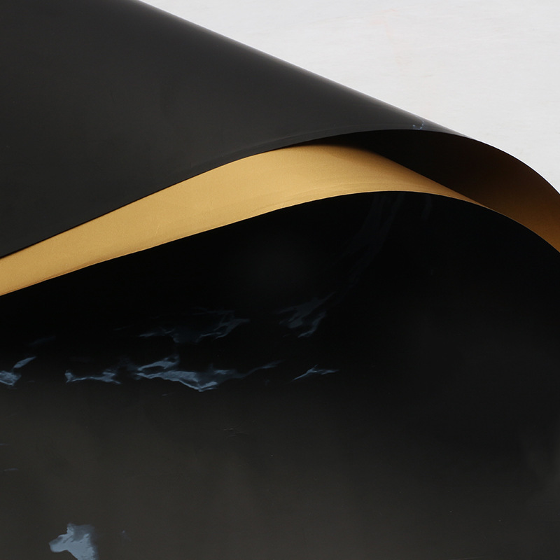 Huaxi comercio exterior transfronterizo mayorista oro lujo papel impermeable mármol oro papel de flor florista papel de embalaje