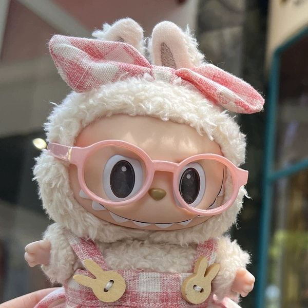 Candy-pink glasses (excluding dolls)