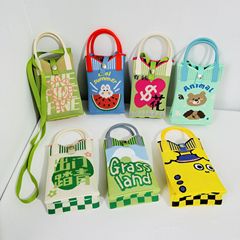 2024新款韓版小眾設計針織手拎包女春夏多巴胺系外出踏青手機包包