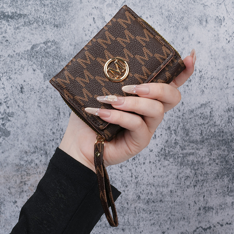 New women's short tri-fold zipper buckle clutch bag, large capacity coin purse and card holder, factory direct sales.