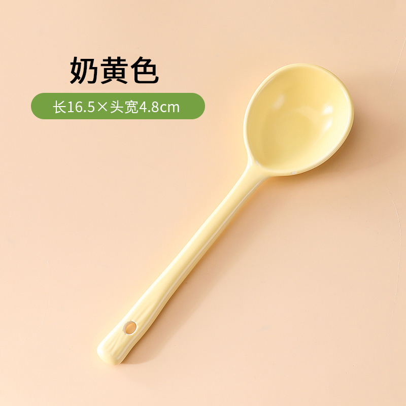크리미한 노란색 직선 손잡이 스푼
