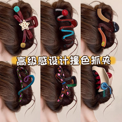 ニッチなデザインのコントラストカラーの女性用ヘアクリップ、後頭部に髪を結ぶための高級で絶妙なヘアクリップ、髪のボリュームの多い髪用のシャーククリップ