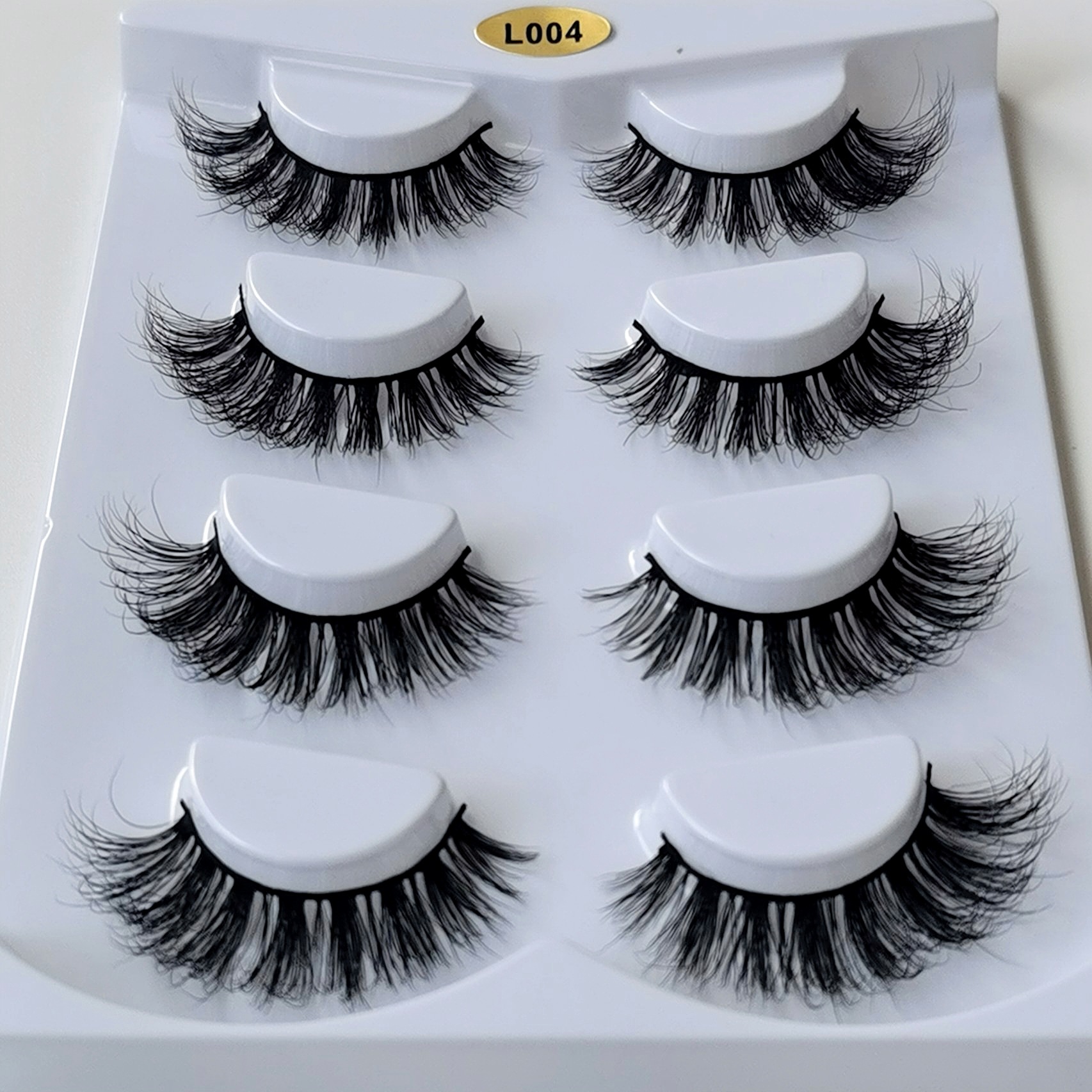 Pestañas postizas de visón para piel pelo grueso de visón europeo y americano desordenado mullido curling 4 pares paquete 3D sangre mixta ojos grandes