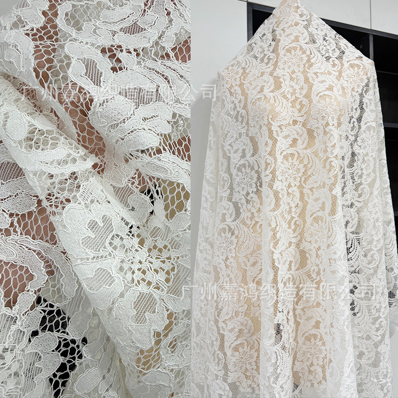 Tejido de encaje retro francés 2026 primavera y verano explosivo tejido de alta calidad para hacer vestido fábrica de tejido de encaje en stock
