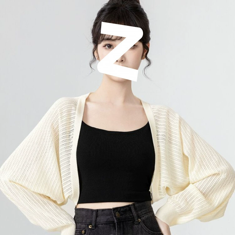 Летний женский комплект 2025 года: абрикосовый кардиган из ледяного шелка, короткая блузка, юбка-миди с бретелями и вязаным шарфом с вырезами.