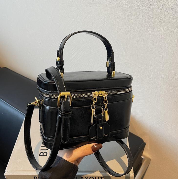 Bagos de mano de fragancia retro para mujeres 2025 nueva moda simple ocio de hombro mochila de viaje bolsa pequeña