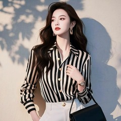 年に起爆した白黒衝突色縞シャツ女2025早春軽贅沢高級感職業通勤フランスシャツ