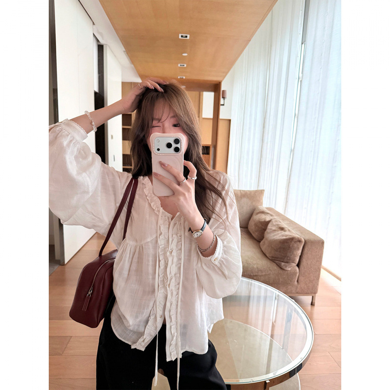 Original quality, early autumn Korean style textured V-neck tie-up ruffled blouse, loose, ethereal, and gentle long-sleeved top.
