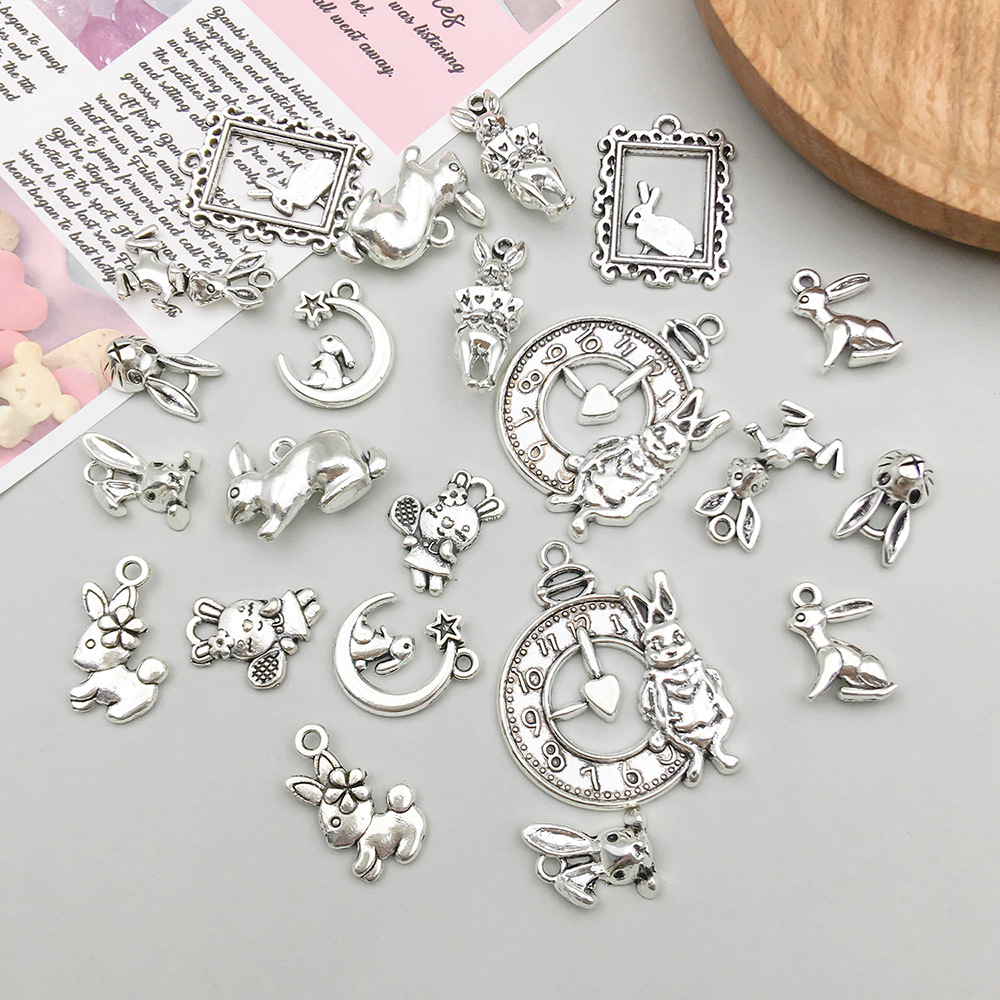 2g Weight Pendant Jewelry Making Type 17*24mm Jewelry Making Size DIY Jewelry Accessories Classification 11 Models, 2 Each, 22/Bag Quantity Zinc alloy Material Rabbit Pattern Polished Finish Plating Design Cute Style 11 Models, 2 Each, 22/Bag 17*24mm Zinc Alloy Rabbit Polished Pendant 6