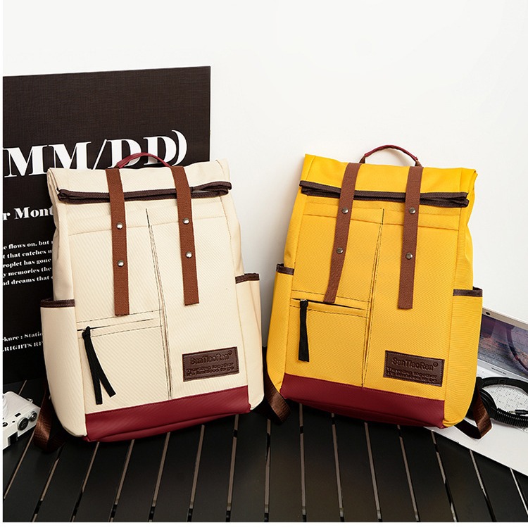 Water repellent capacious travel bag