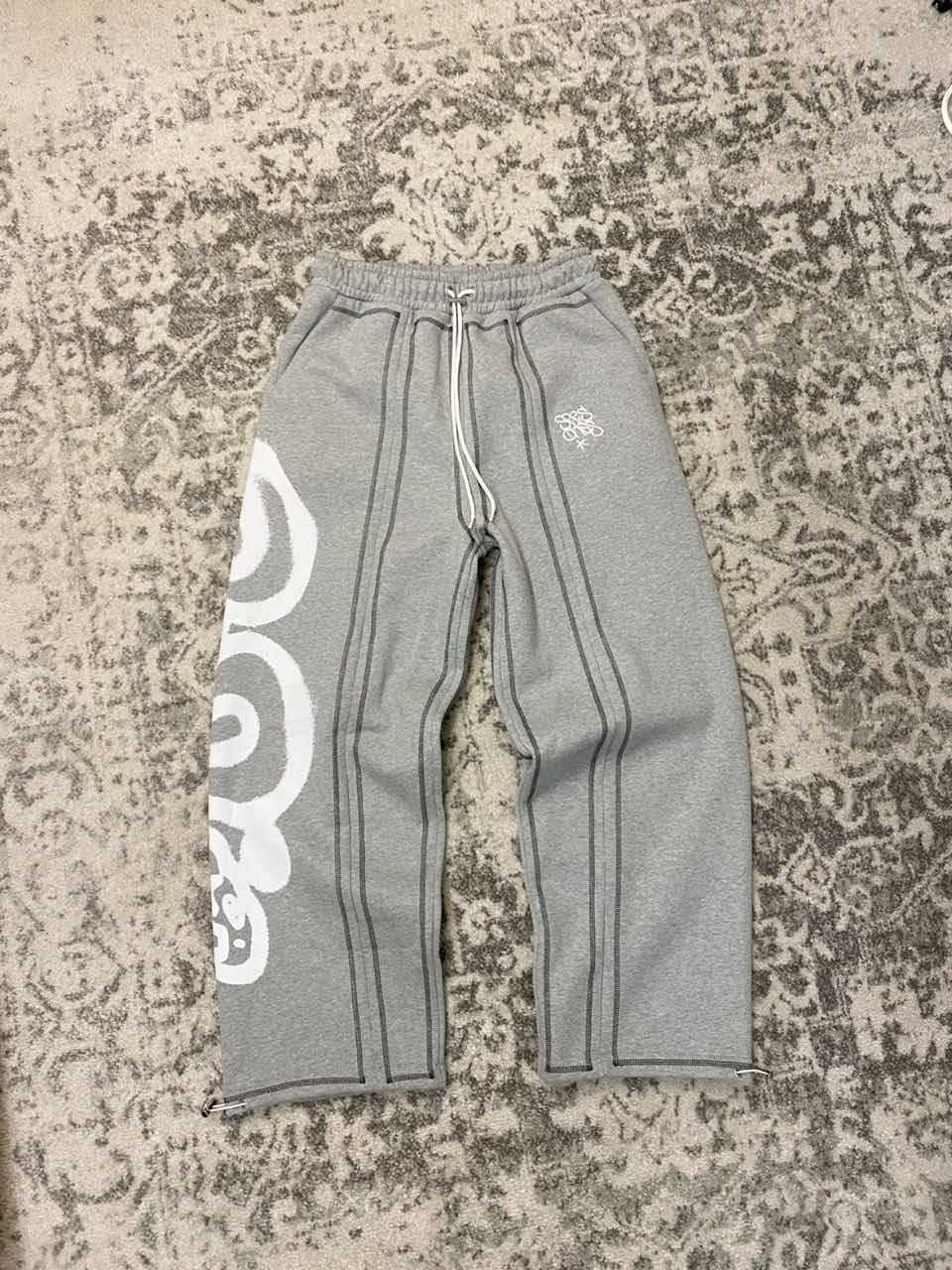 Pantalones de hombre de tendencia transfronteriza europea y americana nueva moda hip-hop street retro holgado casual estampado recto pantalones casuales