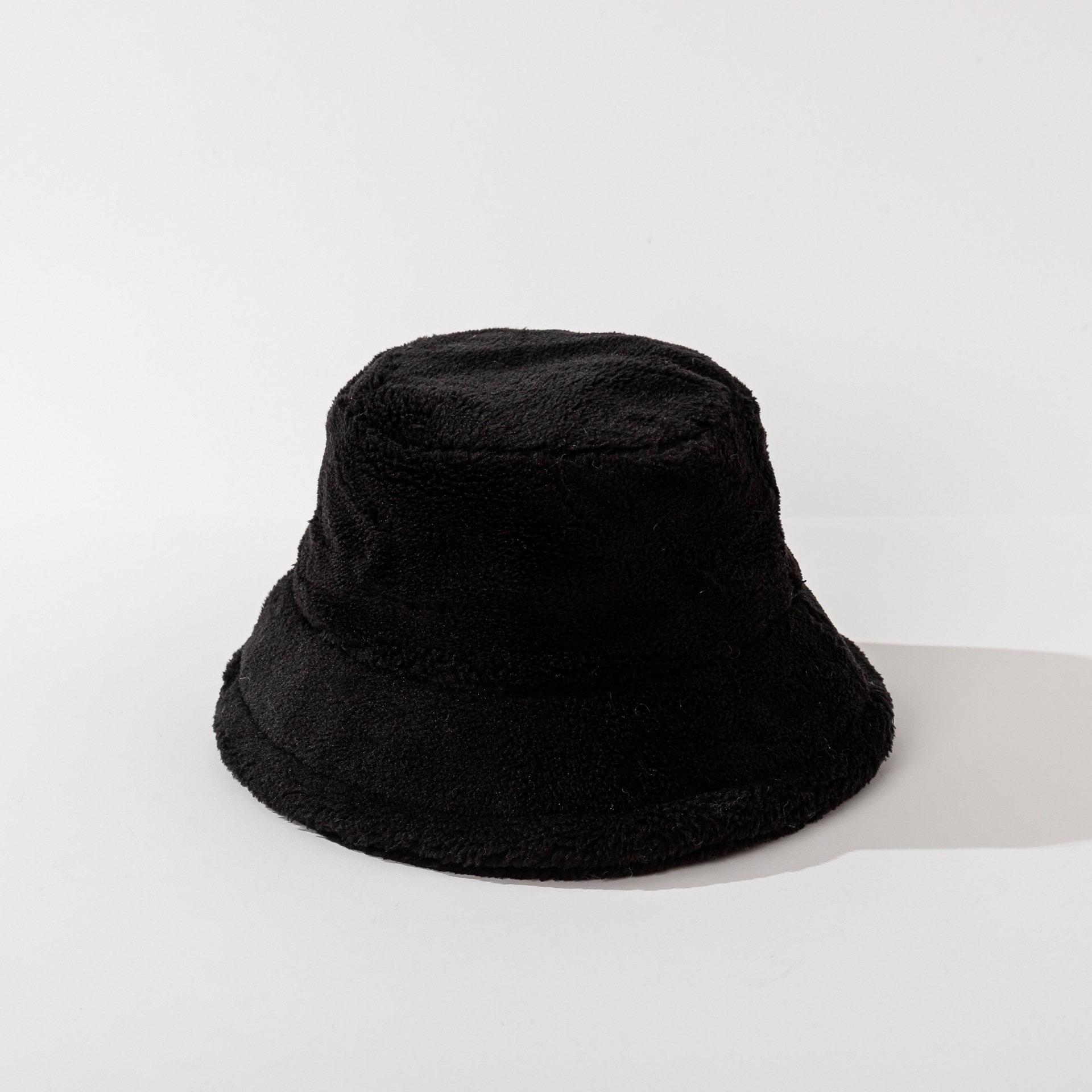 Sombrero de pescador de lana de cordero de color sólido para hombres y mujeres otoño e invierno nuevo cálido sombrero de cuenca engrosada gran circunferencia de la cabeza sombrero simple de todo fósforo