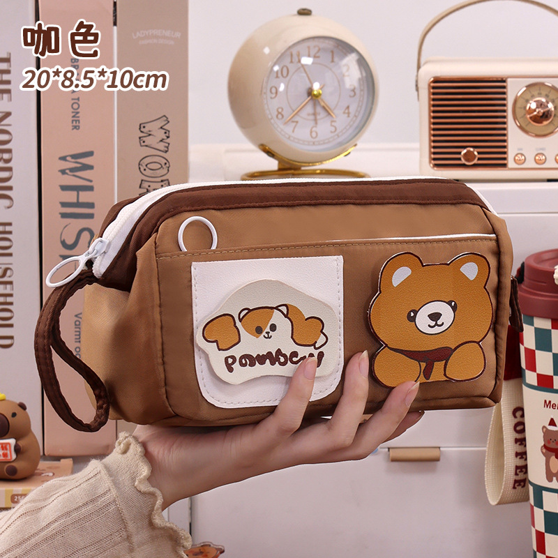 Nuevos productos de la temporada escolar estuche para lápices de alambre de acero estilo ins de dibujos animados lindo estuche para lápices de papelería de gran capacidad para niñas de alto valor