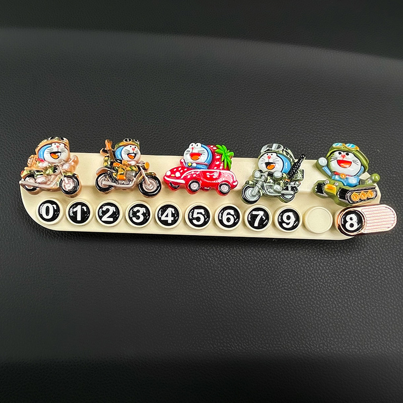 La placa de estacionamiento temporal del automóvil Dingdang Cat, la placa de teléfono móvil femenina, la placa de número del teléfono móvil del automóvil, puede ocultar los productos decorativos