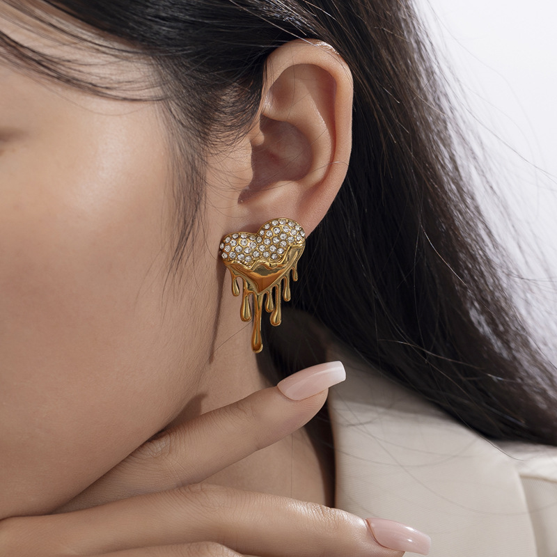 TENA Europa y los Estados Unidos nicho amor ins viento pendientes de acero inoxidable mujeres 18k oro zircón titanio pendientes de acero exagerado sensación de alta calidad