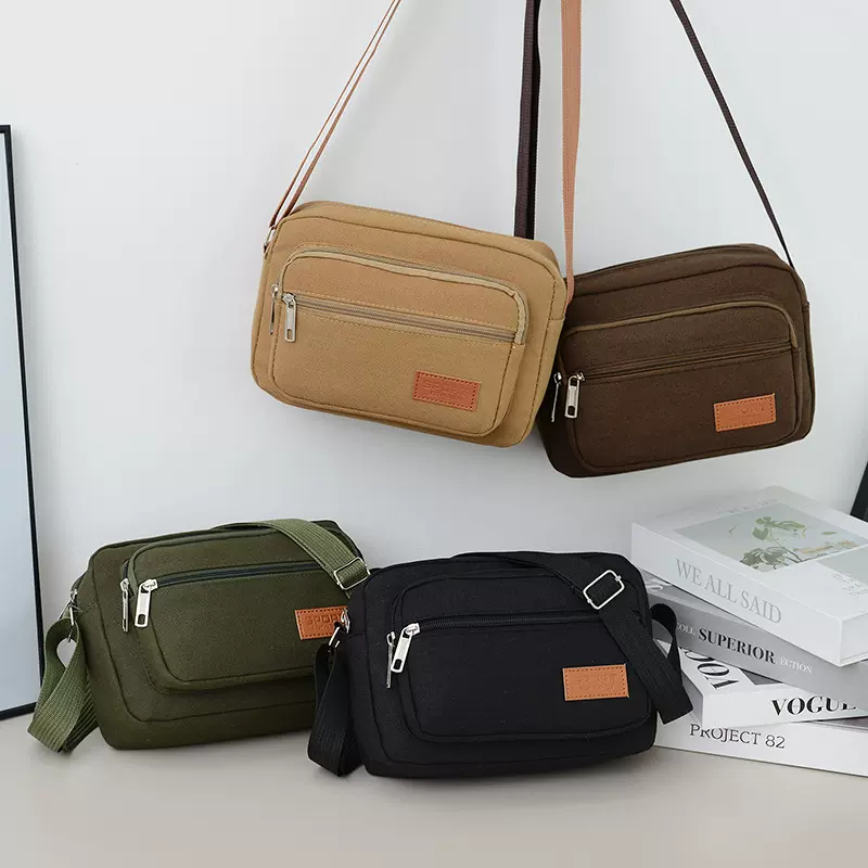 男士挎包帆布包单肩包跨境货源休闲斜挎男包摆地摊工地包大容量包