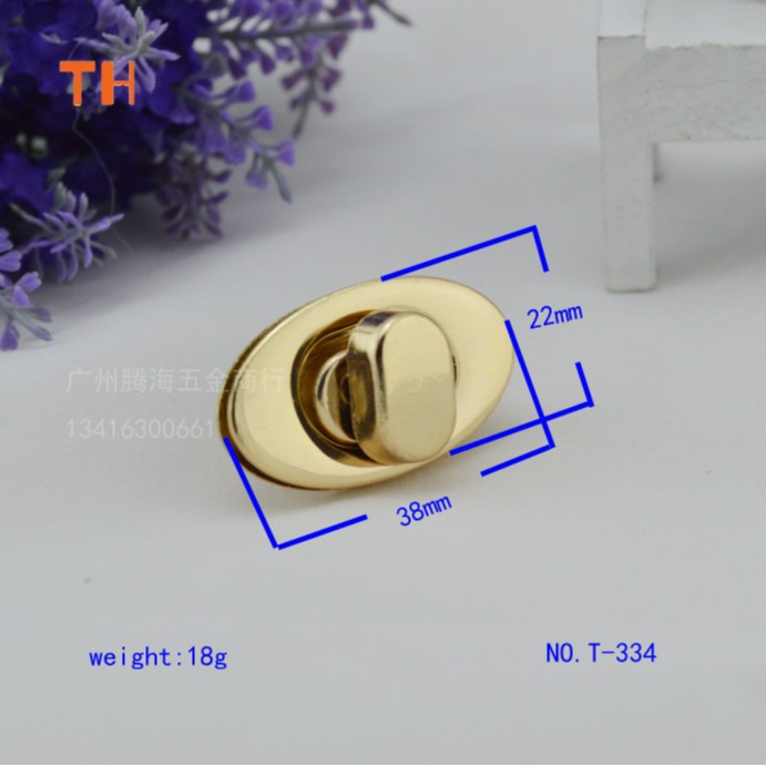 广州皮具五金 常用手袋五金配件 锌合金压铸蛋形拧锁浅金装饰锁扣