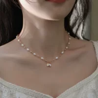 Фея элегантный маленький рис пресноводный жемчуг 14K сумка золотая ниша дизайн чувство свет роскошное пригородное ожерелье ins подарок для женщин