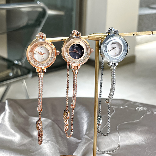 Light luxury women's watch SKHL time and space corridor rhinestone women's fashion shell surface temperament quicksand dial niche bracelet watch