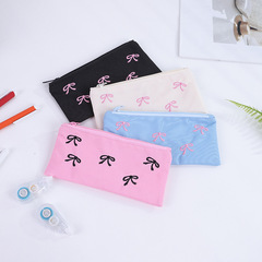 日本のかわいい甘い少女の心の刺繍の蝶結びの雰囲気感の小さい大衆の筆の袋の文房具の袋の化粧品の収納袋