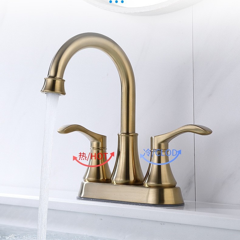 Grifos de lavabo transfronterizos, lavabo de lavabo, lavabo de doble agujero, grifo de agua caliente y fría de oro de seda Omelas