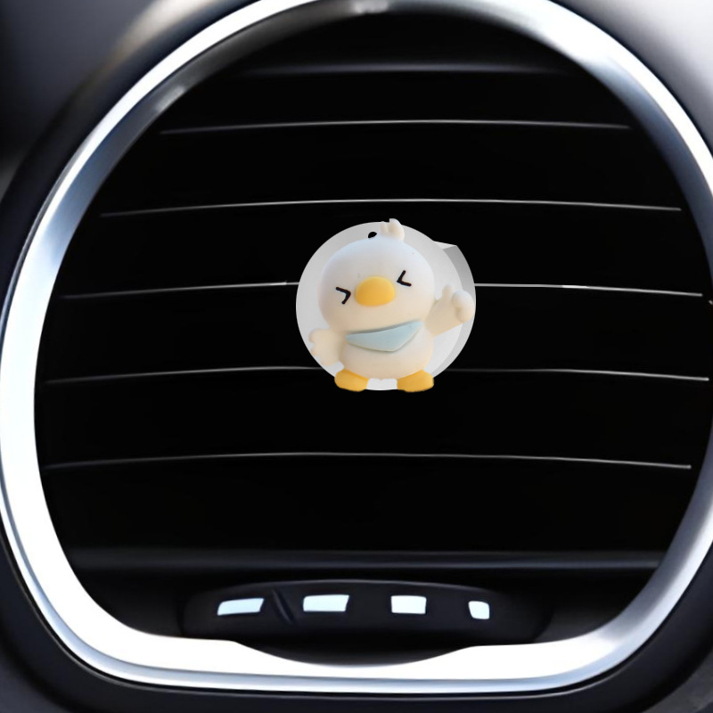 Clip de salida de aire de coche pequeño pato amarillo resina aromaterapia de coche perfume de coche adornos de dibujos animados accesorios de decoración suministros de coche