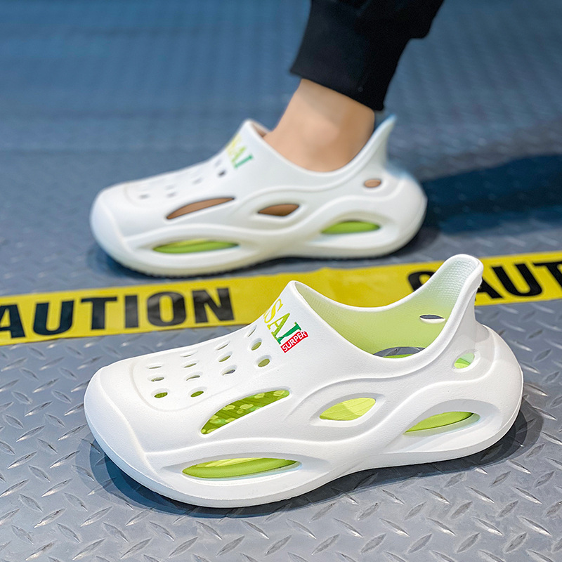 Pareja de zapatos con agujeros verano nuevo estilo para hombres y mujeres con el mismo estilo, sandalias Baotou, transpirables y antideslizantes, zapatos de playa de doble uso para conducir