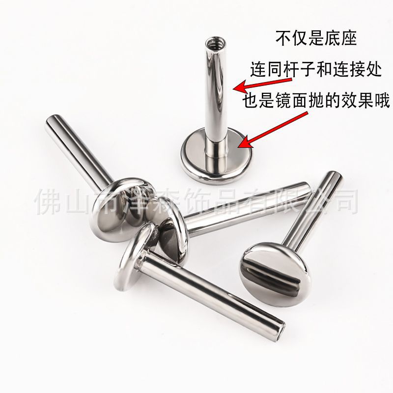 Silver pointed spike labret stud material detail
