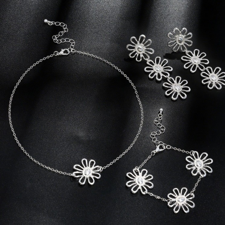 Temperamento transfronterizo europeo y americano único color plateado margarita hueca collar de flores pulsera aretes conjunto joyería para mujer