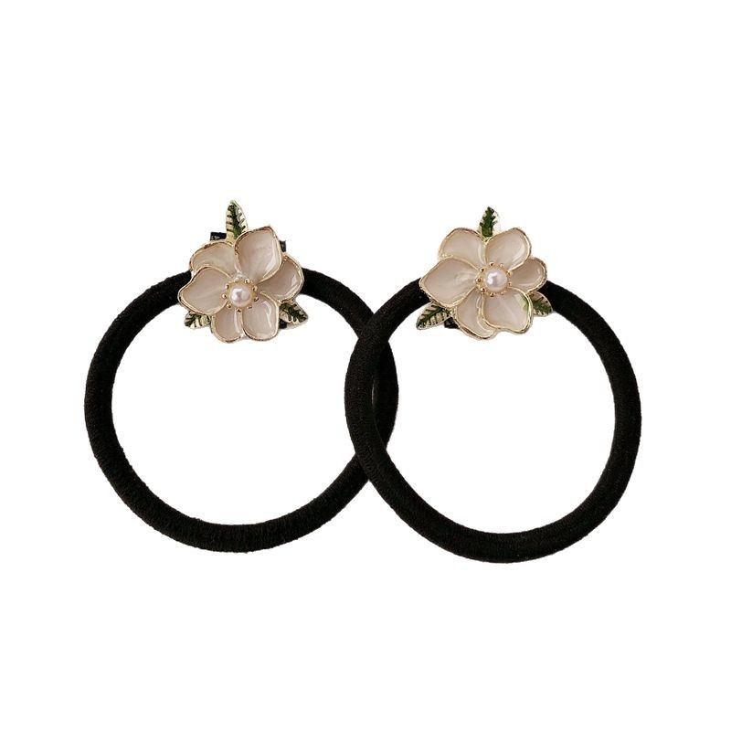 A principios de la primavera, el nuevo estilo coreano de flores metálicas cuerdas de cabeza simple de alta calidad anillo de cabello de cabello de correa de cabello accesorios para el cabello