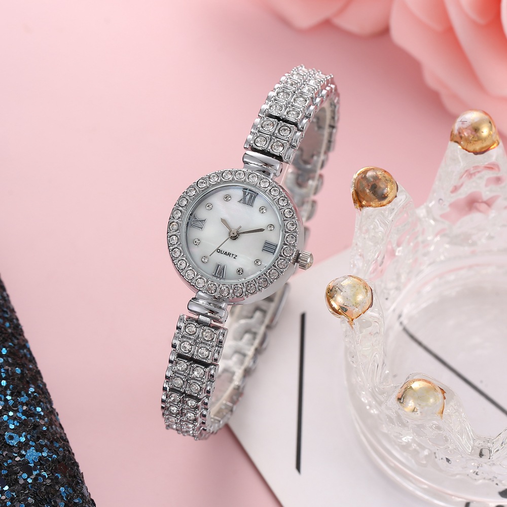 Nueva moda pequeño dial de diamante correa de acero de diamante reloj de mujer
