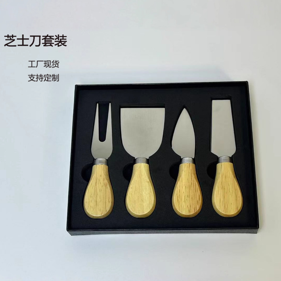 Fabricante de acero inoxidable cuchillo de queso de cuatro piezas conjunto de mango de madera de goma cuchillo de pizza de queso crema tenedor cuchillo de pala
