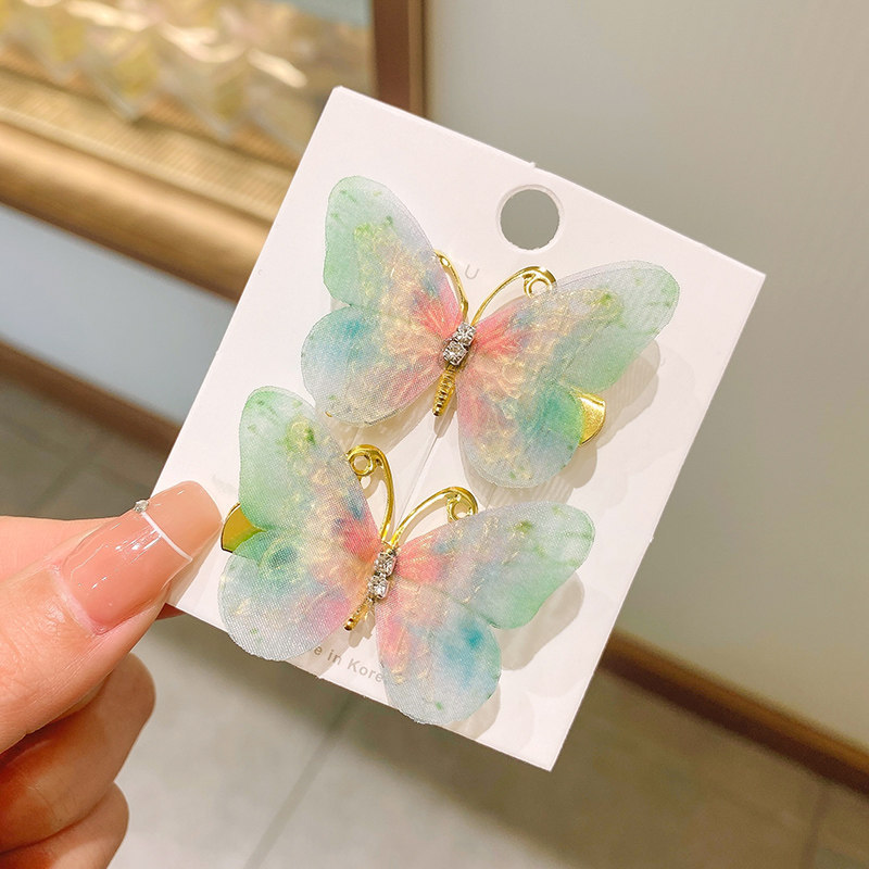 1#Un par de mariposas brillantes.