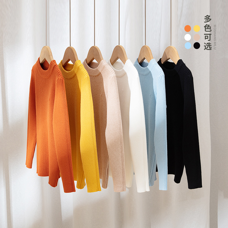 Suéteres infantiles 2025, nuevo estilo de otoño e invierno, ropa interior de punto para niños y niñas, suéter de cuello redondo versátil de color liso.