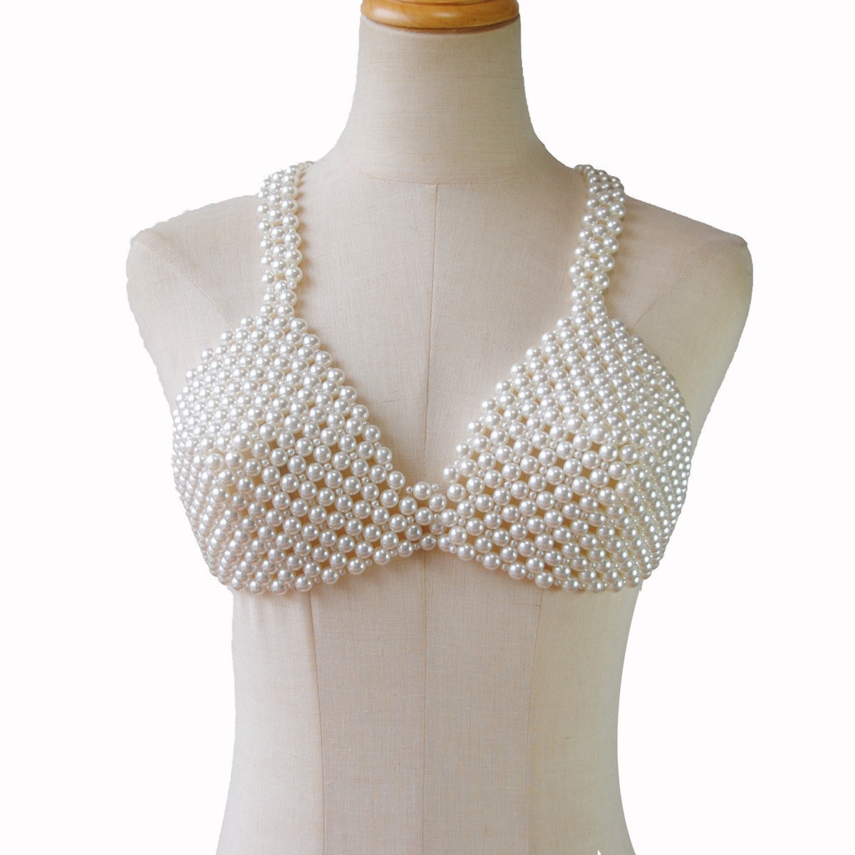 Joyas transfronterizas europeas y americanas cadena de cuerpo de perlas hueca creativa moda sexy chal de perlas borla cadena de pecho de alta calidad