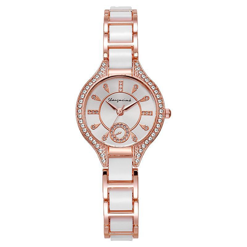 2025 Año de la Serpiente Moda para mujer, moneda fuerte, reloj de cuarzo de cerámica de aleación con reloj de cuarzo de acero al por mayor