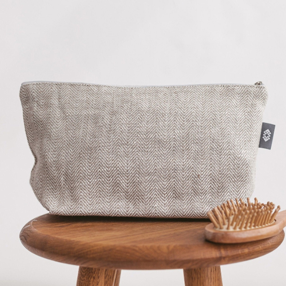 Big white cosmetic bag for traveling with zipper