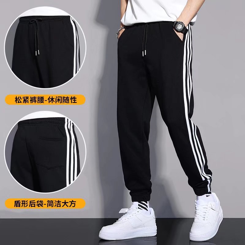Pantalones de rayas japonesas primavera y otoño de los hombres de moda ins Pantalones deportivos rectos sueltos estilo coreano de moda Pantalones casuales a juego