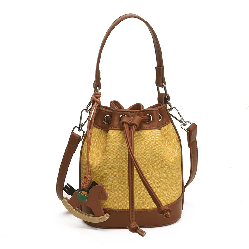 Bolso de cubo de moda transfronteriza 2025 nuevo bolso de hombro de nicho con cordón bolso diagonal bolso de alta gama mujer