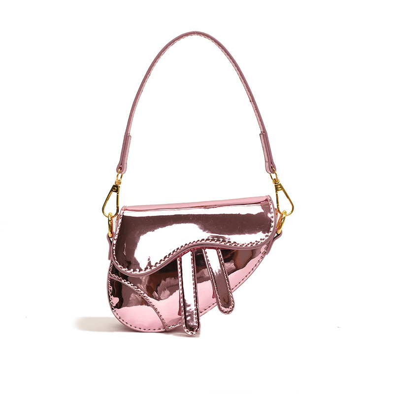 Nuevo bolso de hombro para niñas estilo coreano con acabado brillante, bolso de sillín infantil de color sólido a la moda, bolso moderno para niños para comercio transfronterizo.