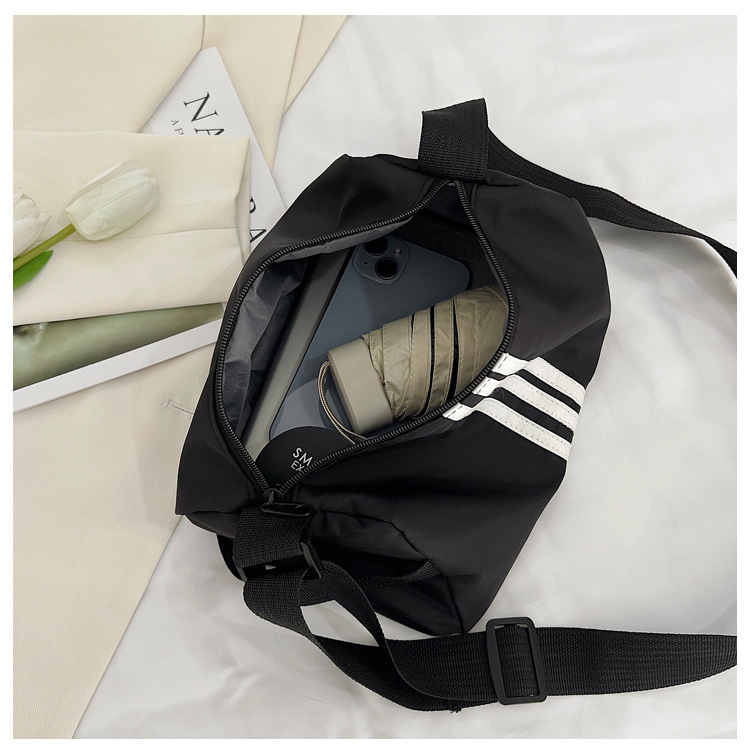 165g Weight Polyester Lining Material Sewing Thread Fashion Element Zipper Closure Type Single Shoulder Strap Strap Type Crossbody Bag Bags Type Daily, Sports Occasion Nylon Material Solid Color Pattern All Seasons Season Women's Gender Classic Style Style Cylindrical Shape Medium Size Women's Medium Nylon Solid Color Classic Style Sewing Thread Cylindrical Zipper Crossbody Bag 无
