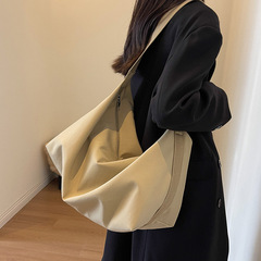 斜めショルダーバッグ女性カジュアル百合大容量学生旅行キャンバスバッグ女性通勤シンプルシングルショルダーバッグ