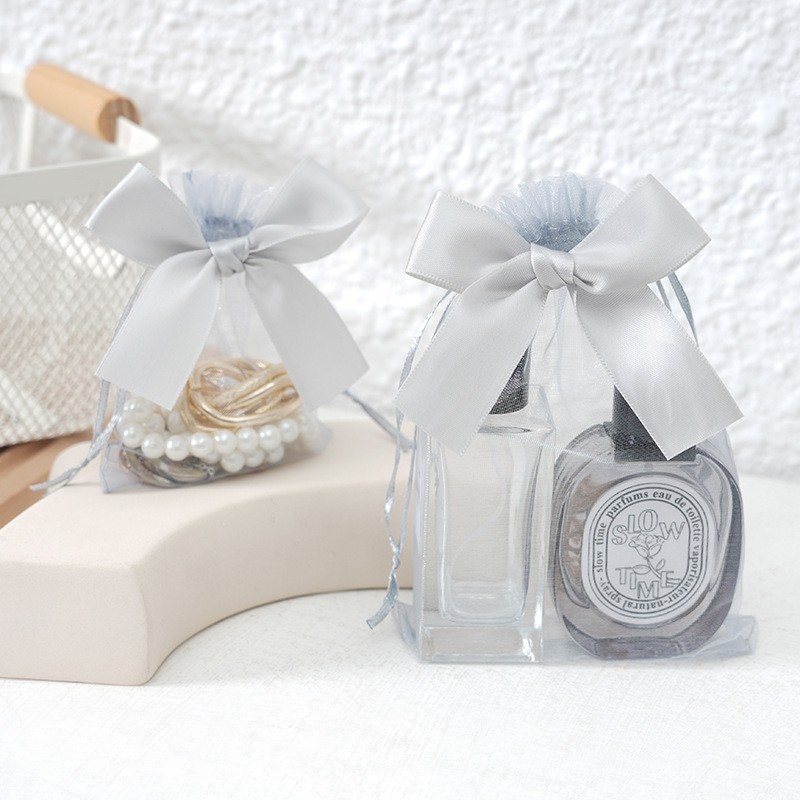 Bolso de gasa con lazo dorado transfronterizo, bolsa de dulces de boda, bolsa de regalo para fiesta, bolsa de embalaje de regalo, bolsillo con cordón