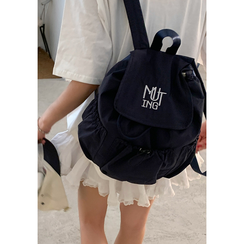 カジュアルナイロンキャンバスバックパック女性の 2025 新しいファッションレターバックパックカレッジスタイル大容量スクールバッグ|undefined
