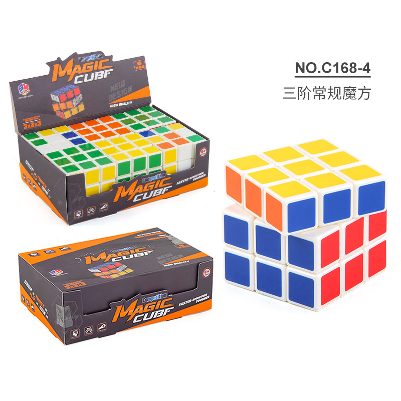 C168 - 4 Caja de exhibición de cubo de Rubik con resorte en fondo blanco 6 en 457,8g