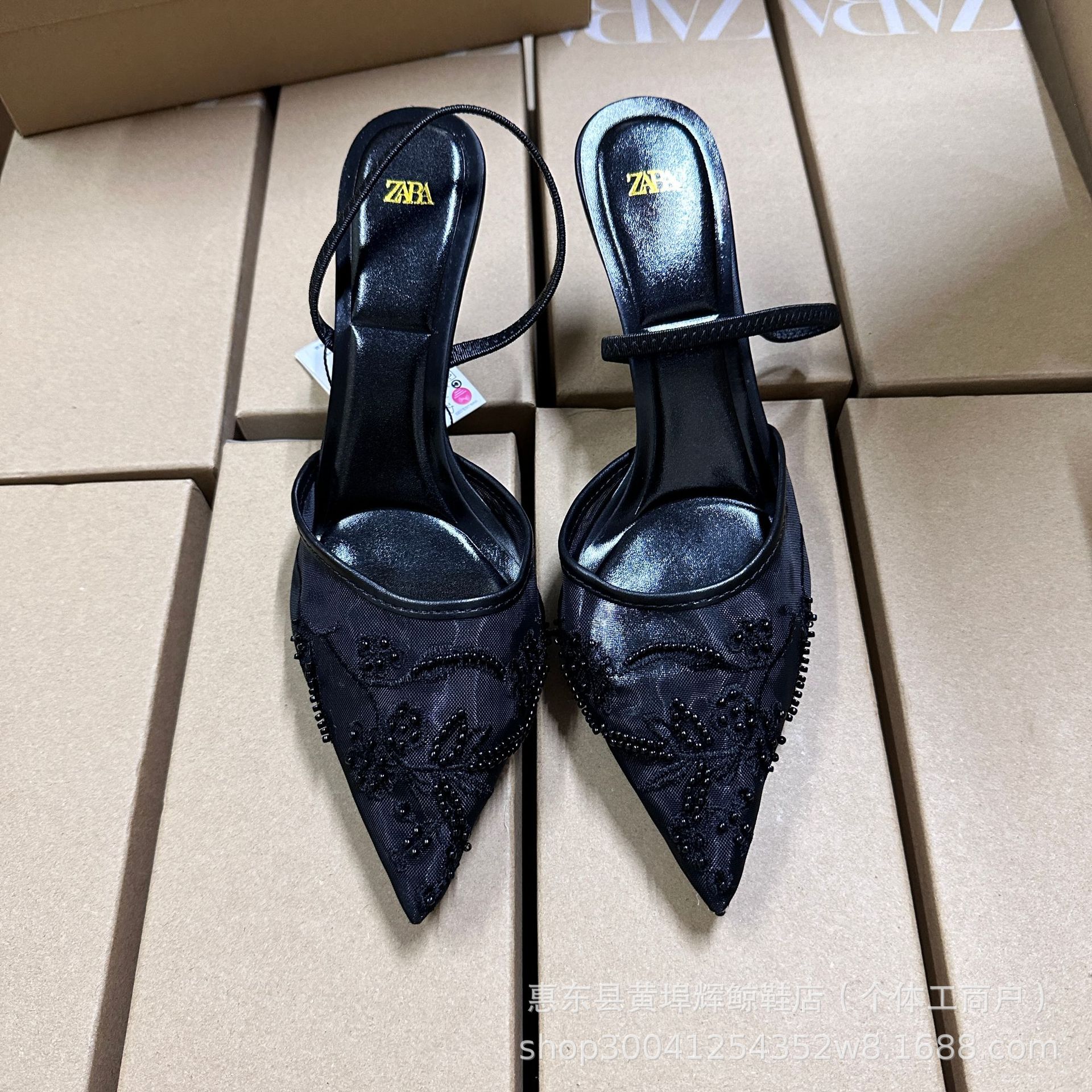 Black embroidered high heels