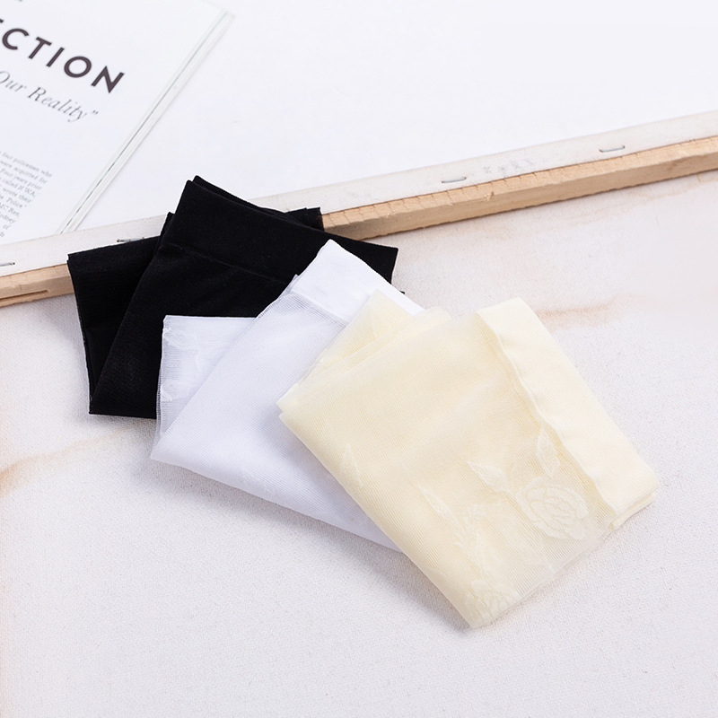 Calcetines por encima de la rodilla de las mujeres ins medias de flores grandes delgadas transparentes estilo JK medias blancas y negras atractivas del color sólido al por mayor