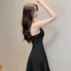 Deep V-neck low cut open back solid color waist closed A-line umbrella skirt bottom skirt suspender dress